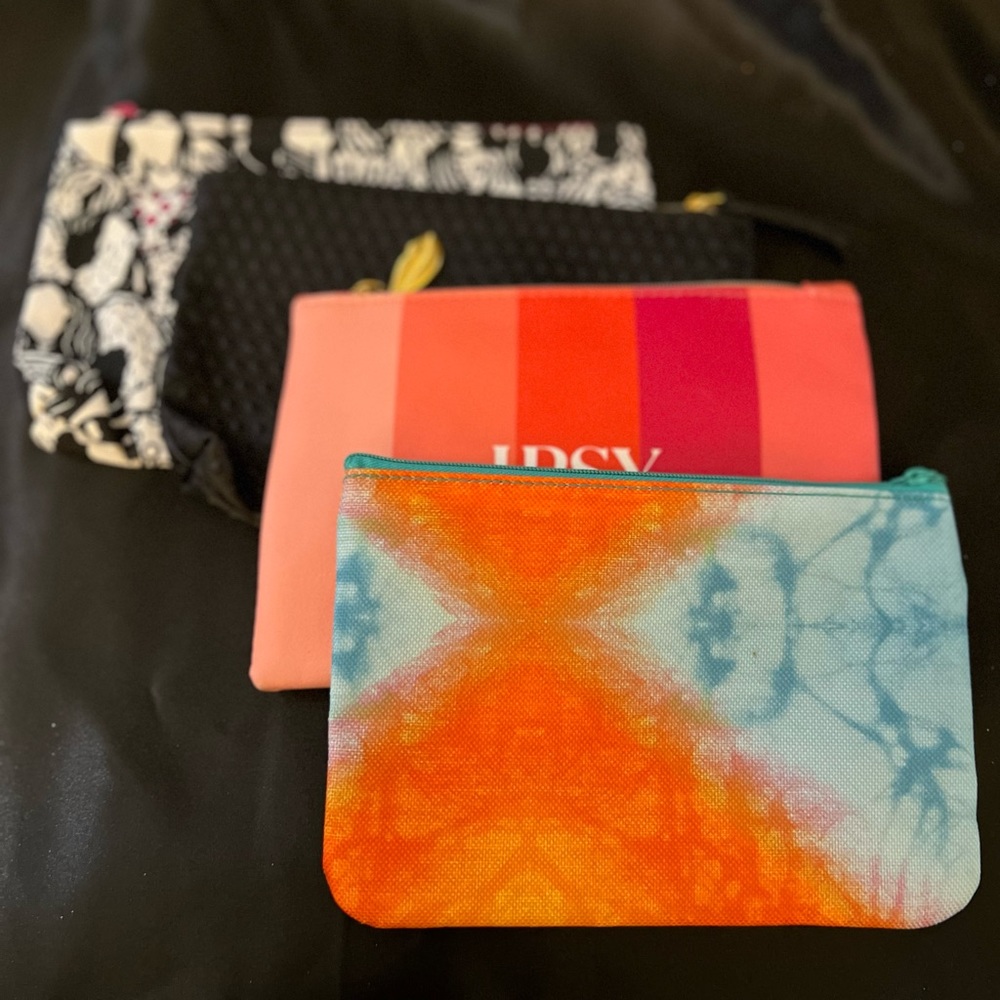 Four never used Ipsy cosmetic bags. Great for your girls birthday parties.